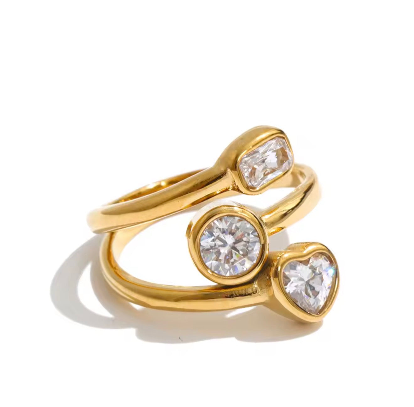 Anillo triple cristal con corazoncito dorado ajustable