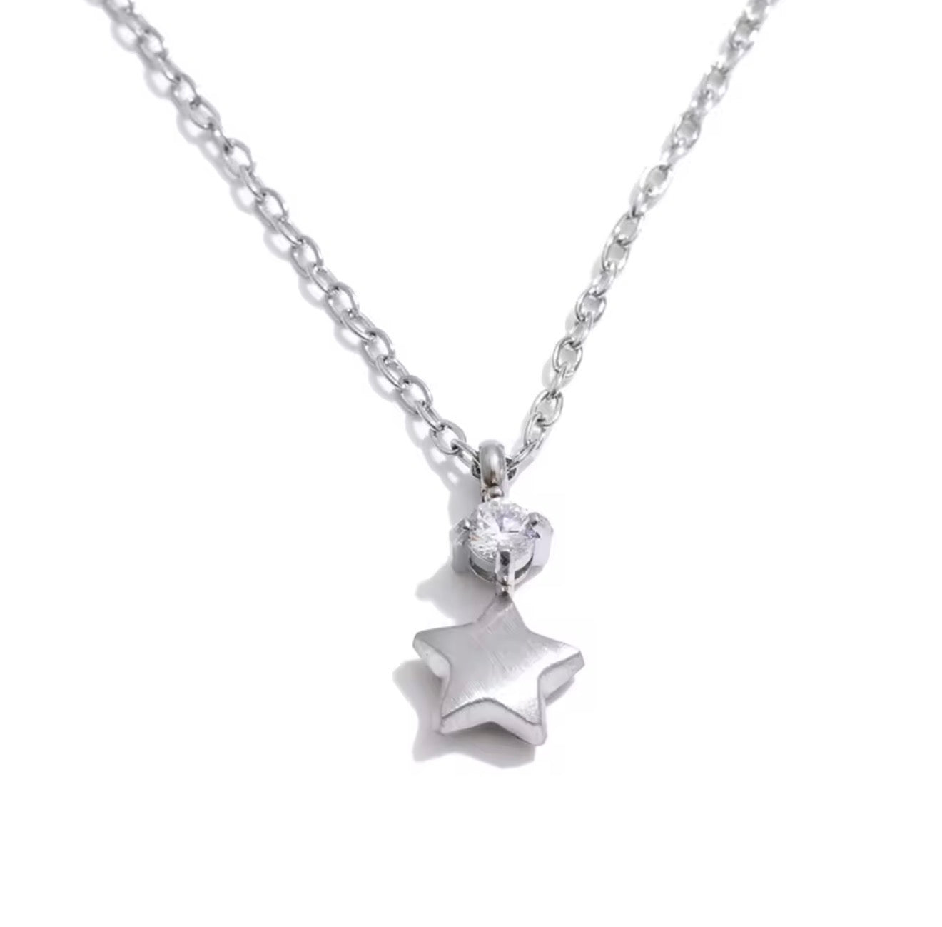 Collar estrella mini con cristalito dorado y plateado