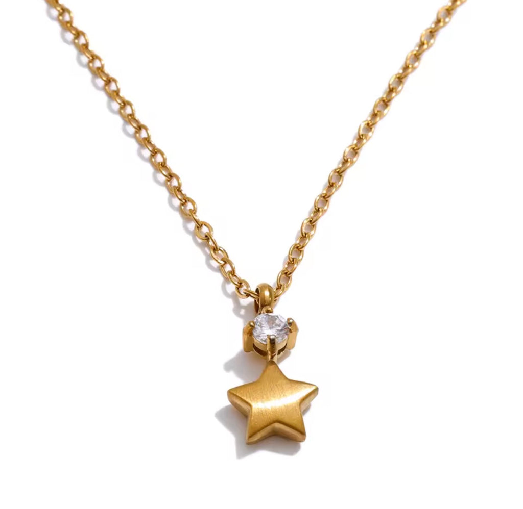 Collar estrella mini con cristalito dorado y plateado