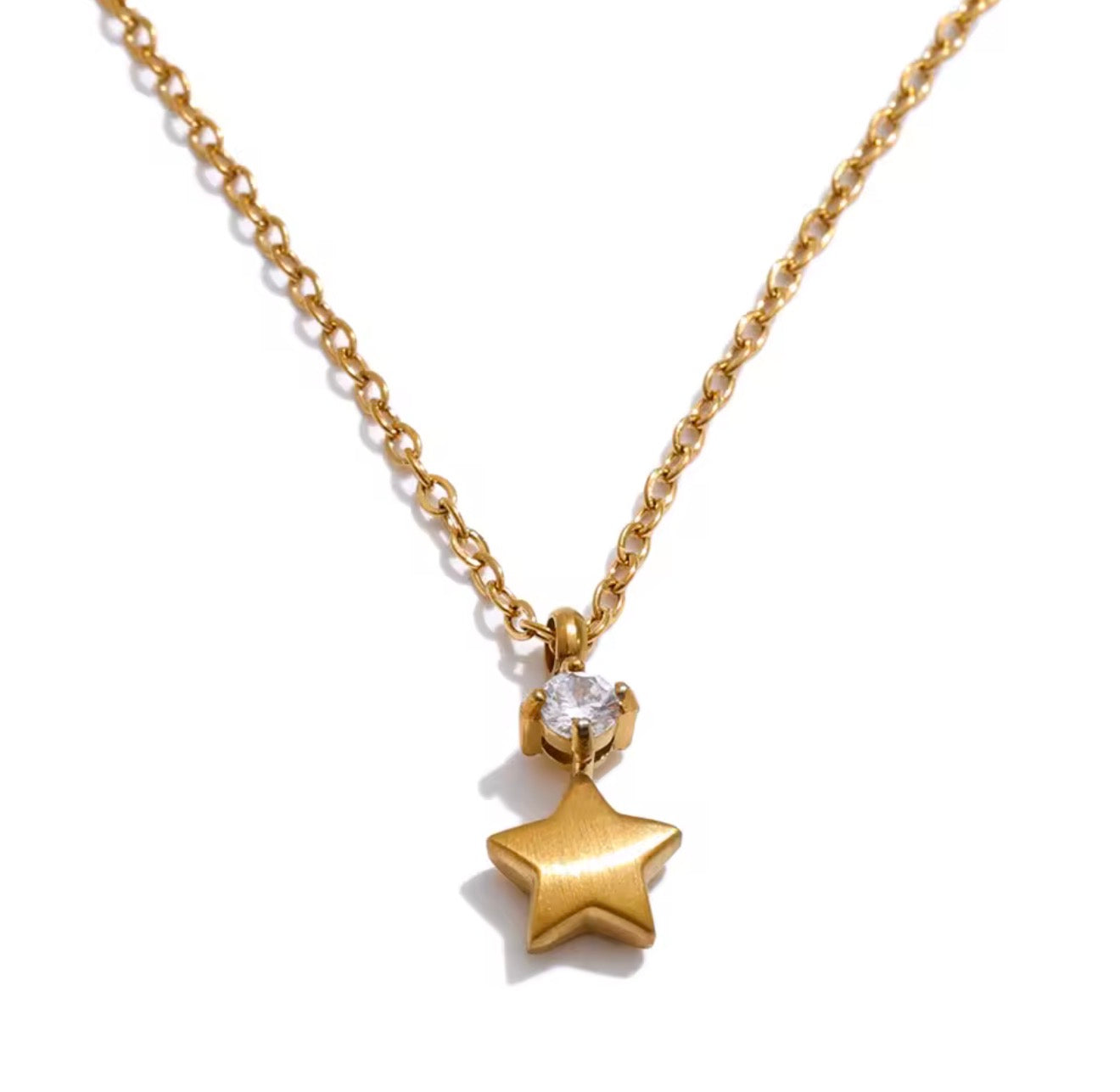 Collar estrella mini con cristalito dorado y plateado