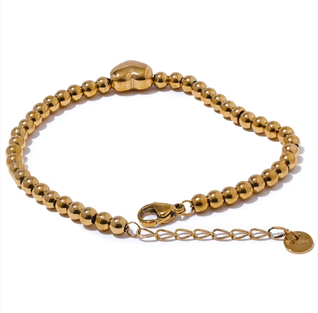 Brazalete de bolitas con corazones