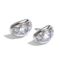 Aretes con cristales triples circulares plateados
