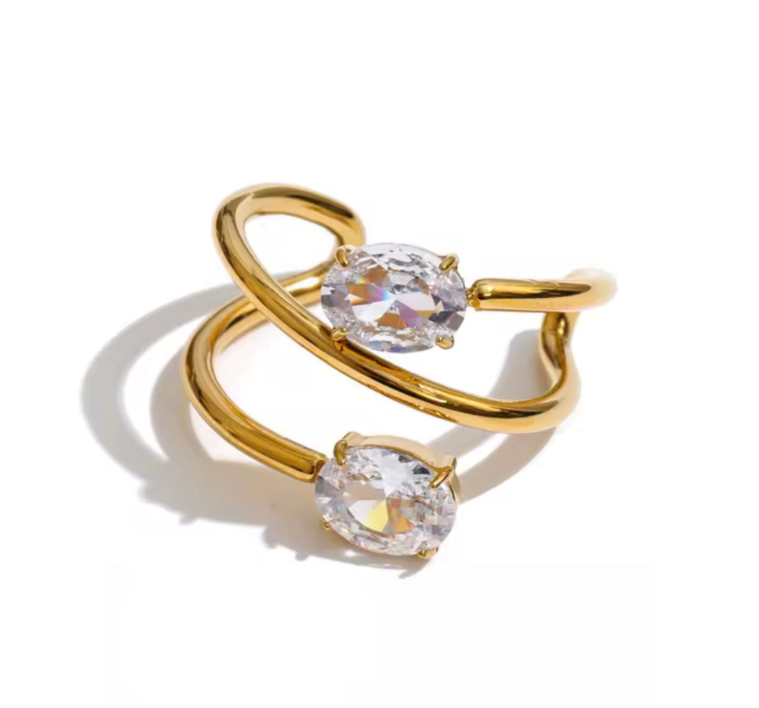 Anillo ajustable delgado irregular con cristales ovalados