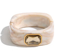 Pulsera rígida de acrílico con cristal beige
