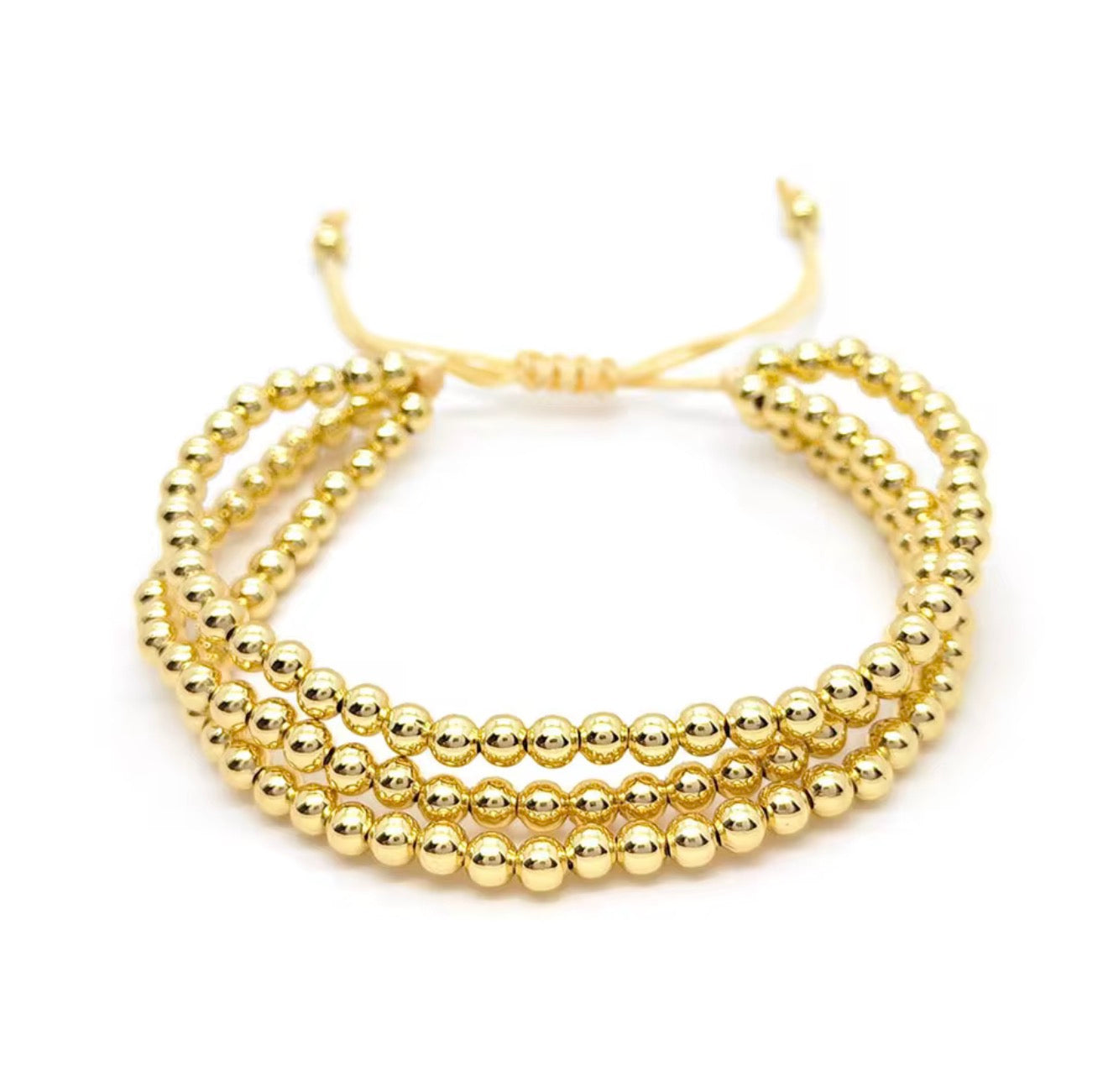 Pulsera ajustable de cuentas doradas