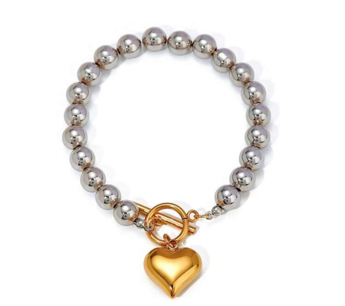 Pulsera de cuentas plateadas con dije de corazón