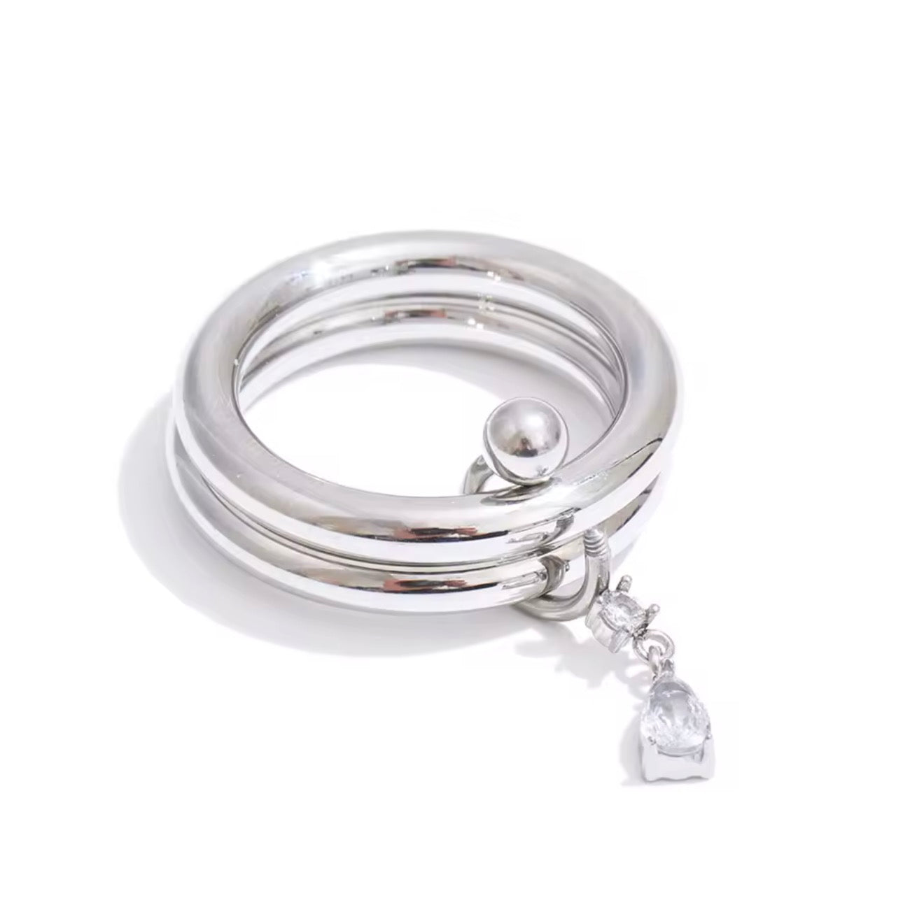 Anillo doble con gotita de cristal colgante