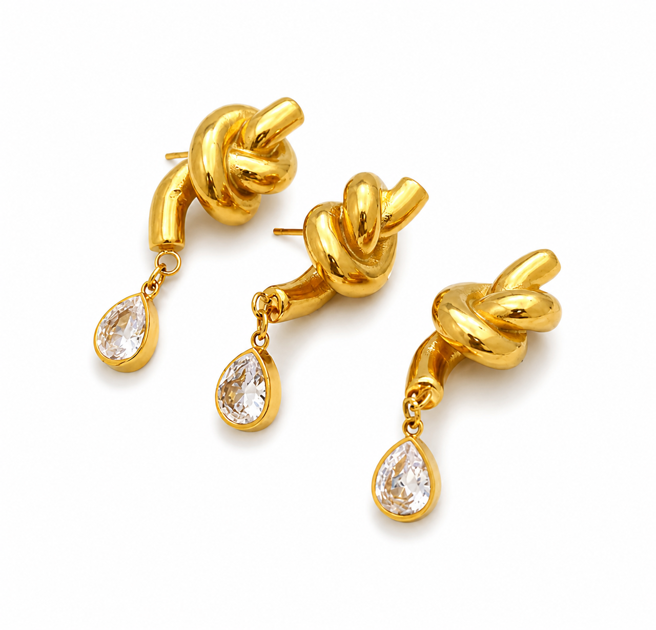 Aretes par de nudo con gota Colgate