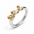 Anillo plateado con aros y cuentas doradas